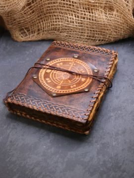 Livre en cuir ancien motif boussole