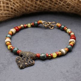 Chaîne de fibule avec pendentif corbeau bronze